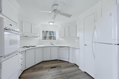 Welcome to this charming double-wide manufactured home located on Lemon Bay Golf Club in Florida - for sale on GolfHomes.com, golf home, golf lot