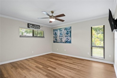 Architectural Gem in Sought-After Phase 1 of Carrollwood Village on Emerald Greens Golf Resort and Country Club in Florida - for sale on GolfHomes.com, golf home, golf lot