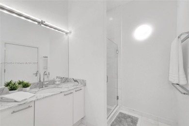 Experience  Miami Beach luxury living in this one-of-a-kind on Miami Beach Golf Club in Florida - for sale on GolfHomes.com, golf home, golf lot
