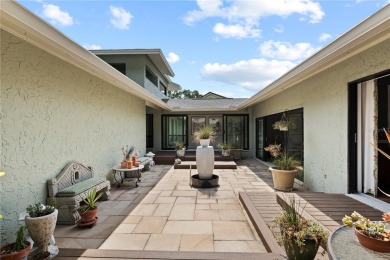 Architectural Gem in Sought-After Phase 1 of Carrollwood Village on Emerald Greens Golf Resort and Country Club in Florida - for sale on GolfHomes.com, golf home, golf lot