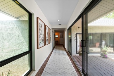 Architectural Gem in Sought-After Phase 1 of Carrollwood Village on Emerald Greens Golf Resort and Country Club in Florida - for sale on GolfHomes.com, golf home, golf lot