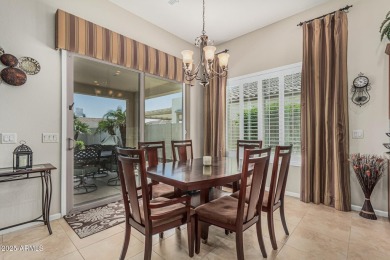 Immaculate 2-Bedroom + Den, 2.5-Bath Home with Open Floor Plan & on Tuscany Falls At Pebble Creek in Arizona - for sale on GolfHomes.com, golf home, golf lot