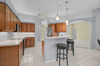 Gracefully positioned on a private homesite within the on Calusa Lakes Golf Club in Florida - for sale on GolfHomes.com, golf home, golf lot