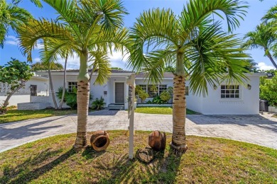 Located inside the exclusive 24-hour guard-gated Normandy Island on Normandy Shores Golf Course in Florida - for sale on GolfHomes.com, golf home, golf lot