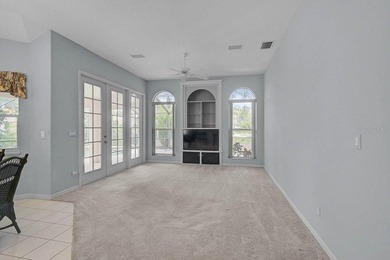 Gracefully positioned on a private homesite within the on Calusa Lakes Golf Club in Florida - for sale on GolfHomes.com, golf home, golf lot