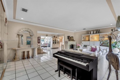 Located inside the exclusive 24-hour guard-gated Normandy Island on Normandy Shores Golf Course in Florida - for sale on GolfHomes.com, golf home, golf lot