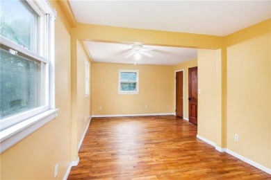 This private and secluded two story home sits on a huge, treed on Loch Lloyd Country Club in Missouri - for sale on GolfHomes.com, golf home, golf lot