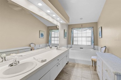 Start the new year in this beautifully maintained 2BR/2BA plus on Peridia Golf and Country Club in Florida - for sale on GolfHomes.com, golf home, golf lot