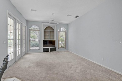 Gracefully positioned on a private homesite within the on Calusa Lakes Golf Club in Florida - for sale on GolfHomes.com, golf home, golf lot