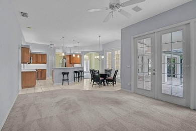 Gracefully positioned on a private homesite within the on Calusa Lakes Golf Club in Florida - for sale on GolfHomes.com, golf home, golf lot