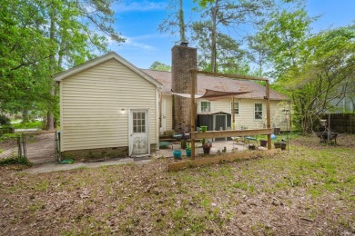 Welcome to this inviting 3-bedroom, 2-bathroom home in an on Golf Club At Wescott Plantation in South Carolina - for sale on GolfHomes.com, golf home, golf lot