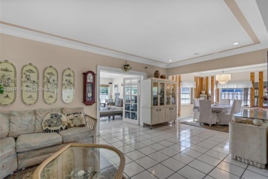 Located inside the exclusive 24-hour guard-gated Normandy Island on Normandy Shores Golf Course in Florida - for sale on GolfHomes.com, golf home, golf lot