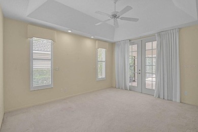 Gracefully positioned on a private homesite within the on Calusa Lakes Golf Club in Florida - for sale on GolfHomes.com, golf home, golf lot