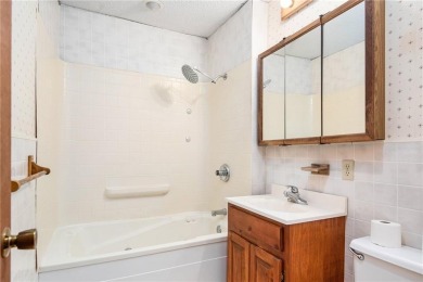 This private and secluded two story home sits on a huge, treed on Loch Lloyd Country Club in Missouri - for sale on GolfHomes.com, golf home, golf lot