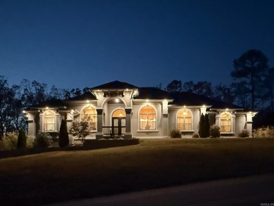 Beautifully set in a prestigious golf community, this inviting on Greystone Country Club in Arkansas - for sale on GolfHomes.com, golf home, golf lot