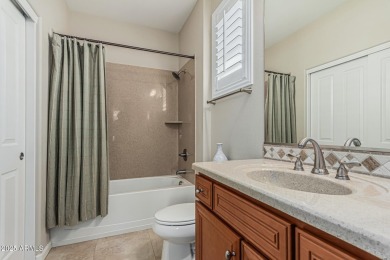 Immaculate 2-Bedroom + Den, 2.5-Bath Home with Open Floor Plan & on Tuscany Falls At Pebble Creek in Arizona - for sale on GolfHomes.com, golf home, golf lot