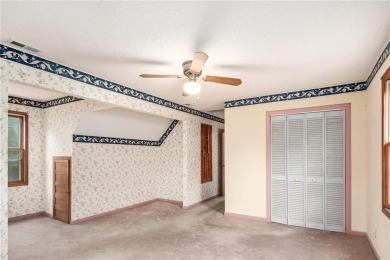 This private and secluded two story home sits on a huge, treed on Loch Lloyd Country Club in Missouri - for sale on GolfHomes.com, golf home, golf lot
