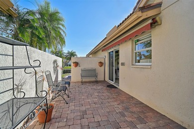 Start the new year in this beautifully maintained 2BR/2BA plus on Peridia Golf and Country Club in Florida - for sale on GolfHomes.com, golf home, golf lot