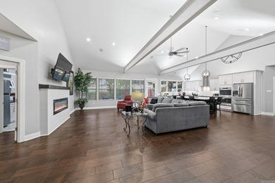 Beautifully set in a prestigious golf community, this inviting on Greystone Country Club in Arkansas - for sale on GolfHomes.com, golf home, golf lot