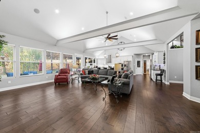 Beautifully set in a prestigious golf community, this inviting on Greystone Country Club in Arkansas - for sale on GolfHomes.com, golf home, golf lot