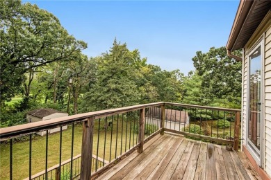 This private and secluded two story home sits on a huge, treed on Loch Lloyd Country Club in Missouri - for sale on GolfHomes.com, golf home, golf lot