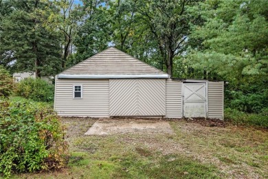 This private and secluded two story home sits on a huge, treed on Loch Lloyd Country Club in Missouri - for sale on GolfHomes.com, golf home, golf lot