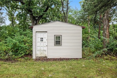 This private and secluded two story home sits on a huge, treed on Loch Lloyd Country Club in Missouri - for sale on GolfHomes.com, golf home, golf lot