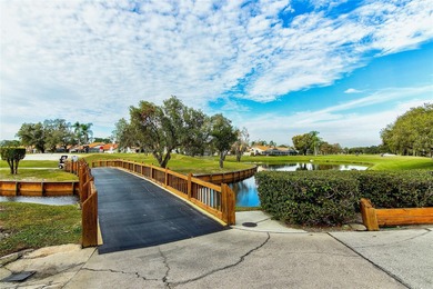 Start the new year in this beautifully maintained 2BR/2BA plus on Peridia Golf and Country Club in Florida - for sale on GolfHomes.com, golf home, golf lot