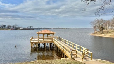 Experience the best of lakefront living in this beautifully on Links At Lands End in Texas - for sale on GolfHomes.com, golf home, golf lot