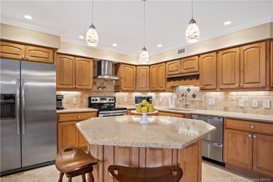 Enjoy courtyard views from this renovated, 2cd floor condo in on Martin County Golf Course in Florida - for sale on GolfHomes.com, golf home, golf lot