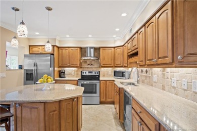 Enjoy courtyard views from this renovated, 2cd floor condo in on Martin County Golf Course in Florida - for sale on GolfHomes.com, golf home, golf lot