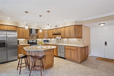 Enjoy courtyard views from this renovated, 2cd floor condo in on Martin County Golf Course in Florida - for sale on GolfHomes.com, golf home, golf lot