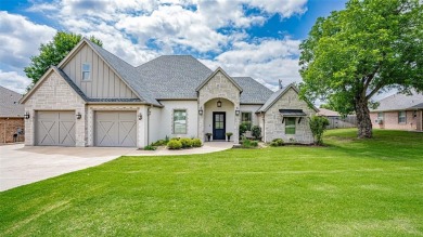 Welcome to your dream custom-built home! This stunning property on De Cordova Bend Country Club in Texas - for sale on GolfHomes.com, golf home, golf lot