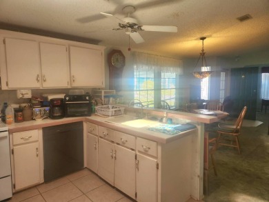 Welcome home to Riverside Club in Ruskin Florida.  Riverside on The Riverside Golf Club in Florida - for sale on GolfHomes.com, golf home, golf lot