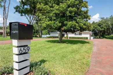 This stunningly remodeled 4/3 pool home in the highly on Lone Palm Golf Club in Florida - for sale on GolfHomes.com, golf home, golf lot