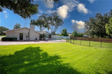 This stunningly remodeled 4/3 pool home in the highly on Lone Palm Golf Club in Florida - for sale on GolfHomes.com, golf home, golf lot