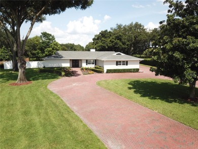 This stunningly remodeled 4/3 pool home in the highly on Lone Palm Golf Club in Florida - for sale on GolfHomes.com, golf home, golf lot