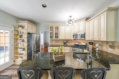 Discover this charming residence nestled in the sought-after on Bridgemill Golf Club in Georgia - for sale on GolfHomes.com, golf home, golf lot