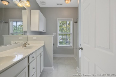 Don't miss your chance to own this immaculately maintained on Carolina Lakes Country Club in North Carolina - for sale on GolfHomes.com, golf home, golf lot