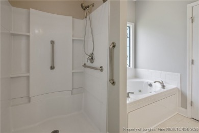 Don't miss your chance to own this immaculately maintained on Carolina Lakes Country Club in North Carolina - for sale on GolfHomes.com, golf home, golf lot