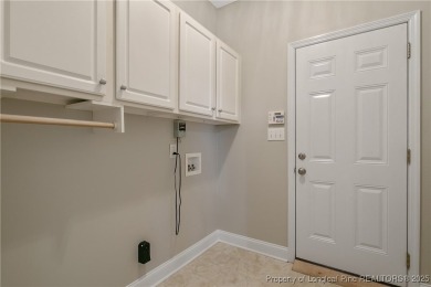 Don't miss your chance to own this immaculately maintained on Carolina Lakes Country Club in North Carolina - for sale on GolfHomes.com, golf home, golf lot