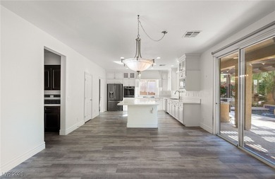 This European-inspired, former model home sits on a premium golf on Tuscany Golf Club in Nevada - for sale on GolfHomes.com, golf home, golf lot