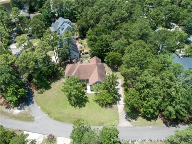 Don't miss your chance to own this immaculately maintained on Carolina Lakes Country Club in North Carolina - for sale on GolfHomes.com, golf home, golf lot