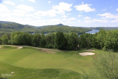 Perched above Lake Burton overlooking stunning views of the lake on Waterfall Country Club in Georgia - for sale on GolfHomes.com, golf home, golf lot