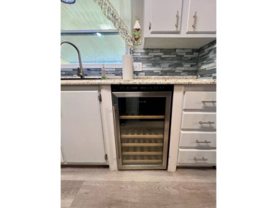 Charming, Fully Furnished Home - Move-In Ready! Step into on Lake Henry Golf Club in Florida - for sale on GolfHomes.com, golf home, golf lot