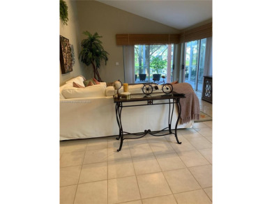 NEW TO THE MARKET 3/2 PONDVIEW HOME IN PRESTIGIOUS CANTERBURY on PGA National Golf Club in Florida - for sale on GolfHomes.com, golf home, golf lot