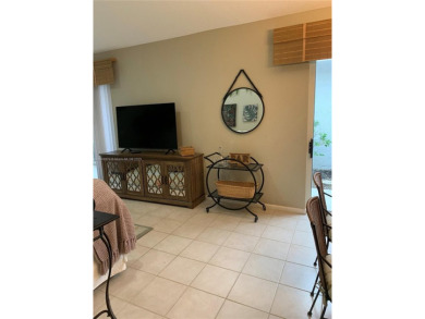 NEW TO THE MARKET 3/2 PONDVIEW HOME IN PRESTIGIOUS CANTERBURY on PGA National Golf Club in Florida - for sale on GolfHomes.com, golf home, golf lot