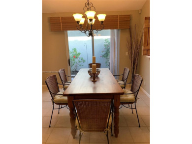 NEW TO THE MARKET 3/2 PONDVIEW HOME IN PRESTIGIOUS CANTERBURY on PGA National Golf Club in Florida - for sale on GolfHomes.com, golf home, golf lot