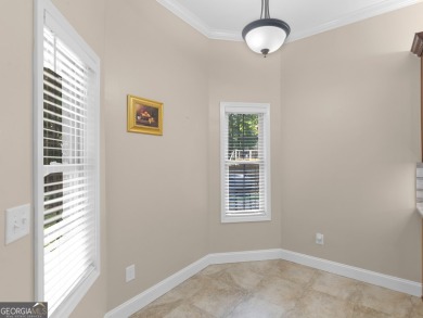 This gorgeous 3 bedroom/2.5 bathroom brick home is located on on Canongate At Georgia National Golf Club in Georgia - for sale on GolfHomes.com, golf home, golf lot