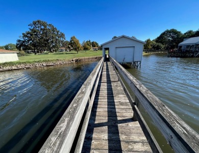 Waterfront Retreat on Lake Fork Golf Club - Rains County in Texas - for sale on GolfHomes.com, golf home, golf lot